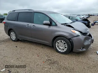 2015 Toyota Sienna XLE with VIN 5TDYK3DC0FS686792, listed as a Copart auction lot 57472045 with 222,663 mi miles and Salvage title. Bid and sale history available at DreamBid. Image 4.