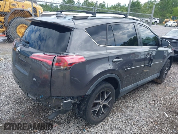 2016 Toyota RAV4 SE with VIN 2T3NFREV2GW309858, listed as a IAAI auction lot 42236828 with 129,602 mi miles and . Bid and sale history available at DreamBid. Image 4.