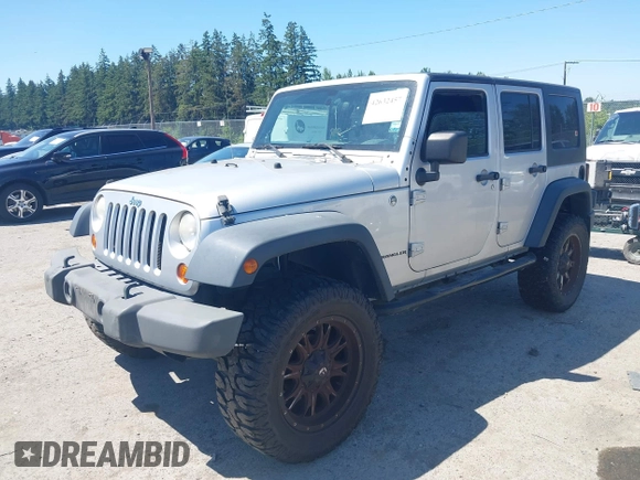 2008 Jeep Wrangler Unlimited X with VIN 1J4GA39148L596727, listed as a IAAI auction lot 42632457 with 175,000 mi miles and . Bid and sale history available at DreamBid. Image 17.