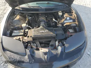 2000 Pontiac Firebird Formula z VIN 2G2FV22G4Y2175318, wystawiony jako Copart lot #68737224 z przebiegiem 229 394 mil mil oraz Szkoda całkowita • Salvage title. Historia ofert i sprzedaży dostępna na DreamBid. Obrazek 13.