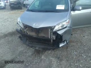 2014 Toyota Sienna XLE with VIN 5TDYK3DC0ES421501, listed as a IAAI auction lot 41672414 with 111,911 mi miles. Bid and sale history available at carsss.com. Image 6.