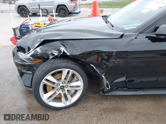 2021 Ford Mustang GT z VIN 1FA6P8CF2M5149643, wystawiony jako IAAI lot #41981794 z przebiegiem 57 345 mil mil oraz . Historia ofert i sprzedaży dostępna na DreamBid. Obrazek 6.