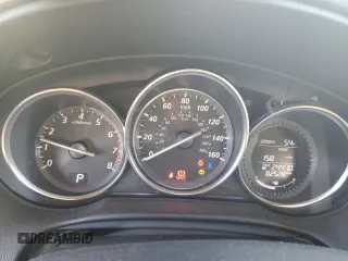 2015 Mazda CX-5 Sport z VIN JM3KE2BE6F0491107, wystawiony jako Copart lot #42462395 z przebiegiem 82 528 mil mil oraz Szkoda całkowita • Salvage title. Historia ofert i sprzedaży dostępna na DreamBid. Obrazek 9.