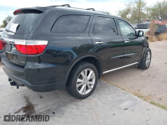 2013 Dodge Durango Crew with VIN 1C4RDHDG1DC647447, listed as a IAAI auction lot 42237714 with 177,523 mi miles and . Bid and sale history available at DreamBid. Image 4.