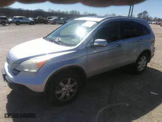 2009 Honda CR-V EX-L with VIN JHLRE48799C014186, listed as a IAAI auction lot 41717915 with 170,157 mi miles. Bid and sale history available at carsss.com. Image 2.