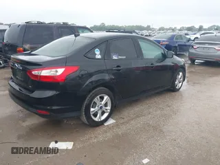 2013 Ford Focus SE with VIN 1FADP3F22DL308840, listed as a IAAI auction lot 42727900 with 112,694 mi miles and . Bid and sale history available at DreamBid. Image 4.
