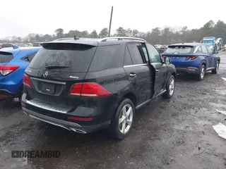 2018 Mercedes-Benz GLE 350 with VIN 4JGDA5HB9JB051872, listed as a IAAI auction lot 41972147 with 48,417 mi miles and . Bid and sale history available at DreamBid. Image 4.