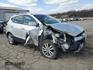 2011 Hyundai Tucson Limited with VIN KM8JUCAC3BU292348, listed as a Copart auction lot 50919925 with 184,505 mi miles and Salvage Title. Bid and sale history available at DreamBid. Image 4.