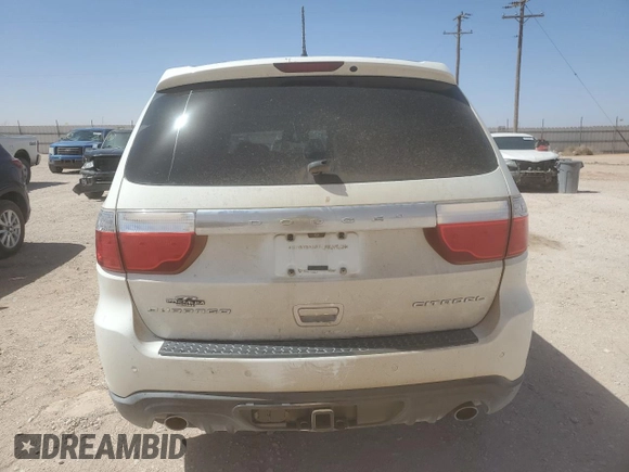 2012 Dodge Durango Citadel with VIN 1C4SDHET5CC361242, listed as a Copart auction lot 49606435 with 118,435 mi miles and Salvage title. Bid and sale history available at DreamBid. Image 6.
