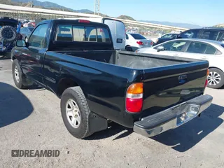 2002 Toyota Tacoma z VIN 5TENL42N92Z064523, wystawiony jako IAAI lot #42228845 z przebiegiem 305 172 mil mil oraz . Historia ofert i sprzedaży dostępna na DreamBid. Obrazek 3.