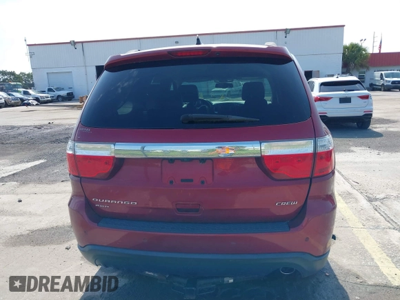 2013 Dodge Durango Crew z VIN 1C4RDJDG6DC672934, wystawiony jako IAAI lot #42542073 z przebiegiem 181 812 mil mil oraz . Historia ofert i sprzedaży dostępna na DreamBid. Obrazek 16.