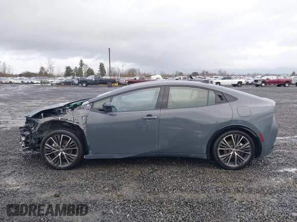 2024 Toyota Prius LE z VIN JTDADABU4R3015000, wystawiony jako IAAI lot #41147221 z przebiegiem 4 411 mil mil oraz . Historia ofert i sprzedaży dostępna na DreamBid. Obrazek 15.