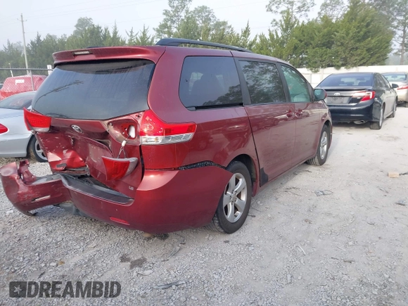 2013 Toyota Sienna LE AAS with VIN 5TDKK3DC1DS368585, listed as a IAAI auction lot 42070311 with 181,408 mi miles. Bid and sale history available at carsss.com. Image 4.