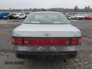 1994 Toyota Camry LE with VIN JT2SK12E2R0207688, listed as a IAAI auction lot 41323827 with 162,680 mi miles. Bid and sale history available at carsss.com. Image 16.