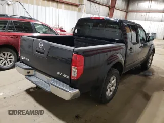 2012 Nissan Frontier SV with VIN 1N6AD0EV9CC450677, listed as a Copart auction lot 60173035 with 128,641 mi miles and Salvage title. Bid and sale history available at DreamBid. Image 3.