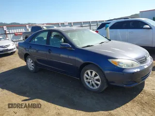 2002 Toyota Camry XLE z VIN JTDBF30K120004751, wystawiony jako IAAI lot #42442710 z przebiegiem 222 366 mil mil oraz . Historia ofert i sprzedaży dostępna na DreamBid. Obrazek 1.