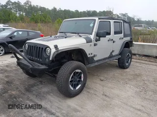 2007 Jeep Wrangler Unlimited X with VIN 1J4GA391X7L107424, listed as a IAAI auction lot 41752013 with 196,557 mi miles and . Bid and sale history available at DreamBid. Image 17.