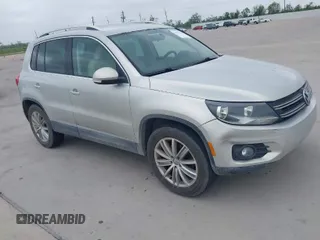 2012 Volkswagen Tiguan SE with VIN WVGAV7AX0CW545753, listed as a IAAI auction lot 41974134 with 143,105 mi miles and . Bid and sale history available at DreamBid. Image 1.