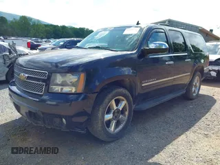 2011 Chevrolet Suburban LTZ with VIN 1GNSKKE38BR359006, listed as a IAAI auction lot 42183589 with 162,154 mi miles and . Bid and sale history available at DreamBid. Image 6.