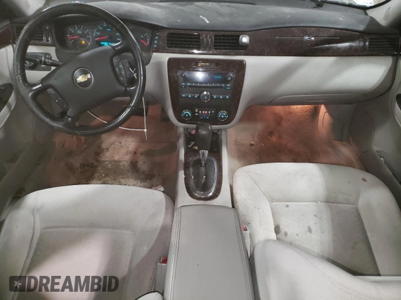 2014 Chevrolet Impala LT with VIN 2G1WB5E37E1100847, listed as a Copart auction lot 58580765 with 104,949 mi miles and Salvage title. Bid and sale history available at DreamBid. Image 8.