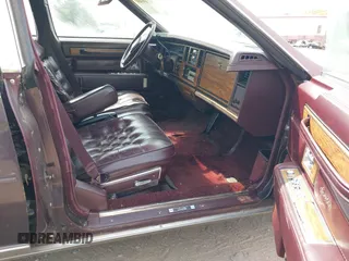 1985 Cadillac Seville z VIN 1G6KS6989FE821515, wystawiony jako IAAI lot #42009508 z przebiegiem 13 600 mil mil oraz . Historia ofert i sprzedaży dostępna na DreamBid. Obrazek 5.