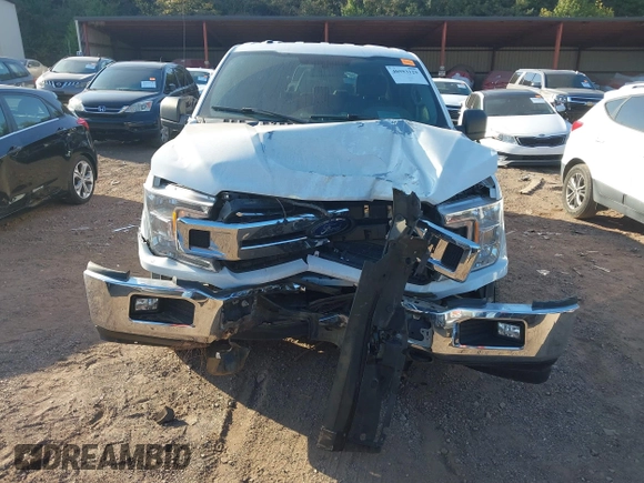 2018 Ford F-150 XL with VIN 1FTEW1E55JKF29898, listed as a IAAI auction lot 40593129 with 158,663 mi miles and . Bid and sale history available at carsss.com. Image 6.