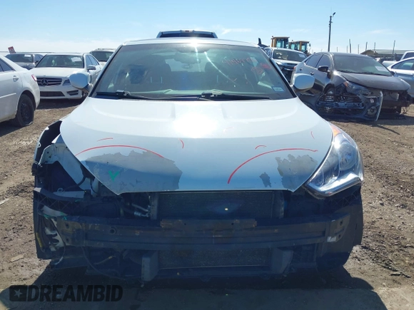2016 Hyundai Veloster z VIN KMHTC6AD3GU267365, wystawiony jako IAAI lot #41469796 z przebiegiem 111 791 mil mil oraz . Historia ofert i sprzedaży dostępna na DreamBid. Obrazek 6.