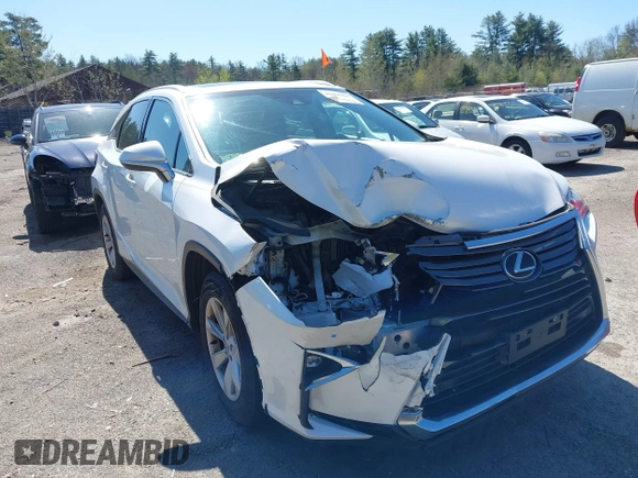 2016 Lexus RX 350 z VIN 2T2BZMCA7GC012913, wystawiony jako IAAI lot #42060406 z przebiegiem 155 215 mil mil oraz . Historia ofert i sprzedaży dostępna na DreamBid. Obrazek 13.