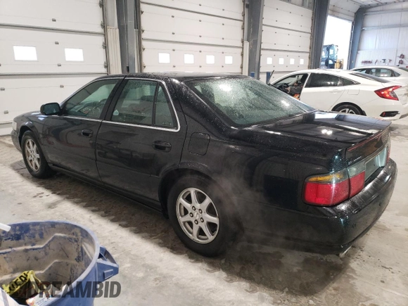 2002 Cadillac Seville Touring STS z VIN 1G6KY54962U158476, wystawiony jako Copart lot #86624774 z przebiegiem 77 818 mil mil oraz Szkoda całkowita • Salvage title. Historia ofert i sprzedaży dostępna na DreamBid. Obrazek 2.
