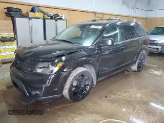 2013 Dodge Journey Crew with VIN 3C4PDCCG4DT693869, listed as a Copart auction lot 63666684 with 134,424 mi miles and Salvage title. Bid and sale history available at DreamBid. Image 1.