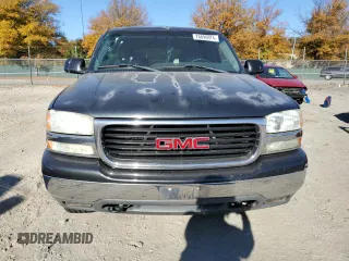2004 GMC Yukon SLE with VIN 1GKEK13V24J236327, listed as a Copart auction lot 76896974 with 151,028 mi miles and Salvage Title. Bid and sale history available at carsss.com. Image 5.