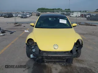 2013 Volkswagen Beetle with VIN 3VWHX7AT0DM603661, listed as a IAAI auction lot 42464030 with 95,159 mi miles and . Bid and sale history available at DreamBid. Image 6.