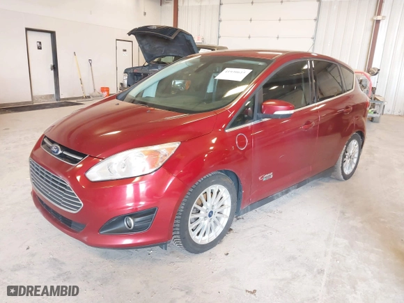 2015 Ford C-Max Energi SEL with VIN 1FADP5CU8FL101857, listed as a IAAI auction lot 41930615 with 148,579 mi miles. Bid and sale history available at carsss.com. Image 2.