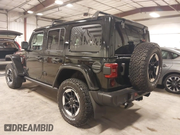 2021 Jeep Wrangler Unlimited Rubicon with VIN 1C4HJXFN2MW719135, listed as a IAAI auction lot 41835698 with 20,447 mi miles and . Bid and sale history available at DreamBid. Image 3.