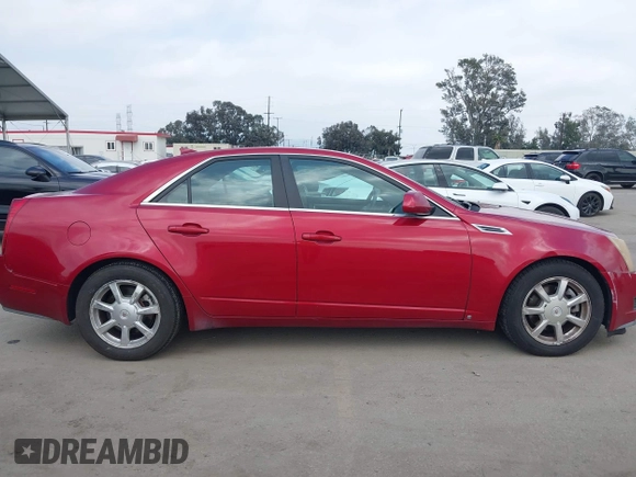 2009 Cadillac CTS AWD w/1SA with VIN 1G6DG577990113572, listed as a IAAI auction lot 42110784 with 229,692 mi miles. Bid and sale history available at carsss.com. Image 13.