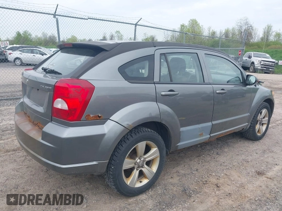 2012 Dodge Caliber SXT with VIN 1C3CDWDA5CD534457, listed as a IAAI auction lot 42197032 with 170,739 mi miles and . Bid and sale history available at DreamBid. Image 4.