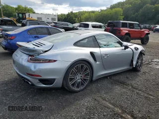 2015 Porsche 911 Turbo S with VIN WP0AD2A97FS166370, listed as a Copart auction lot 68497274 with 3,015 mi miles and Salvage Title. Bid and sale history available at carsss.com. Image 3.