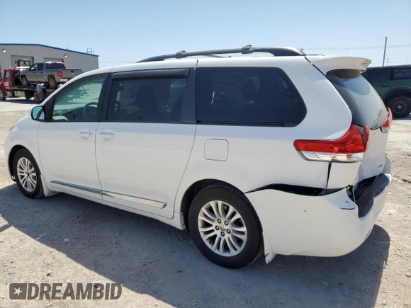 2013 Toyota Sienna XLE AAS with VIN 5TDYK3DC1DS368452, listed as a Copart auction lot 52638715 with 163,254 mi miles and Salvage Title. Bid and sale history available at carsss.com. Image 2.