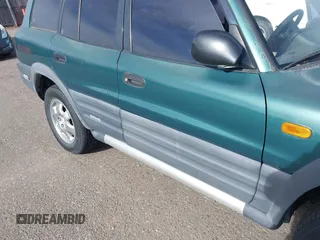 1997 Toyota RAV4 with VIN JT3HP10V2V0147285, listed as a IAAI auction lot 41856796 with 303,535 mi miles and . Bid and sale history available at DreamBid. Image 6.