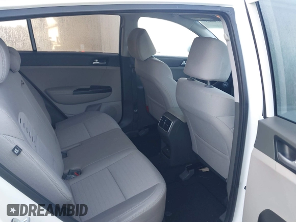 2018 Kia Sportage LX z VIN KNDPMCAC3J7394485, wystawiony jako IAAI lot #41106807 z przebiegiem 104 865 mil mil oraz . Historia ofert i sprzedaży dostępna na DreamBid. Obrazek 8.