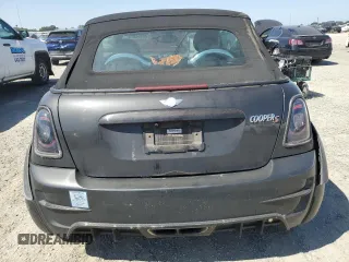 2011 MINI Convertible S с VIN WMWZP3C59BT249133, выставлен на аукционе Copart как лот 56402615 с пробегом 103 809 миль миль и Списание • Salvage title. История ставок и продаж доступна на DreamBid. Изображение 6.