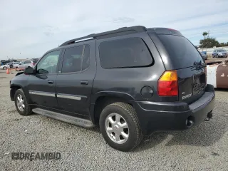 2004 GMC Envoy XL SLE with VIN 1GKES16S946145690, listed as a Copart auction lot 82453264 with 159,001 mi miles and Salvage Title. Bid and sale history available at carsss.com. Image 2.
