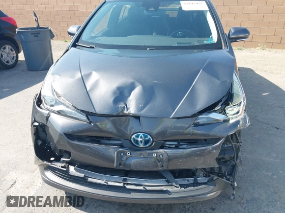 2021 Toyota Prius L Eco with VIN JTDKAMFU4M3144985, listed as a IAAI auction lot 42443957 with 20,816 mi miles and . Bid and sale history available at DreamBid. Image 6.