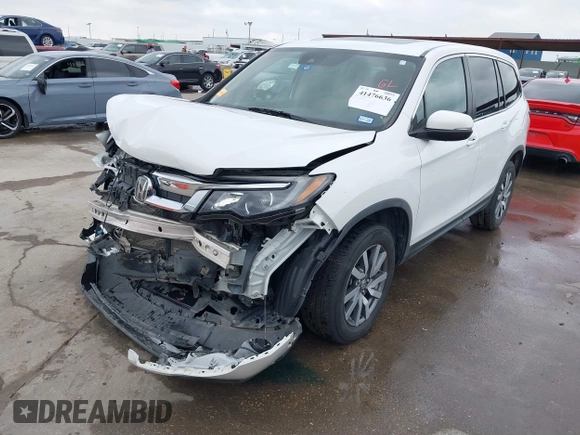 2021 Honda Pilot EX-L with VIN 5FNYF6H55MB031305, listed as a IAAI auction lot 41476636 with 58,754 mi miles. Bid and sale history available at carsss.com. Image 2.