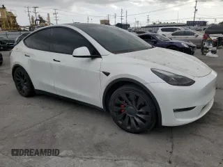 2023 Tesla Model Y Performance z VIN 7SAYGDEFXPF801908, wystawiony jako Copart lot #50737655 z przebiegiem Nie podano mil oraz Szkoda całkowita • Salvage title. Historia ofert i sprzedaży dostępna na DreamBid. Obrazek 4.