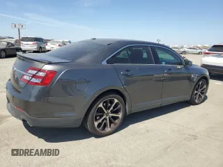2015 Ford Taurus SEL with VIN 1FAHP2E8XFG209390, listed as a Copart auction lot 58992305 with 99,498 mi miles and Salvage title. Bid and sale history available at DreamBid. Image 3.