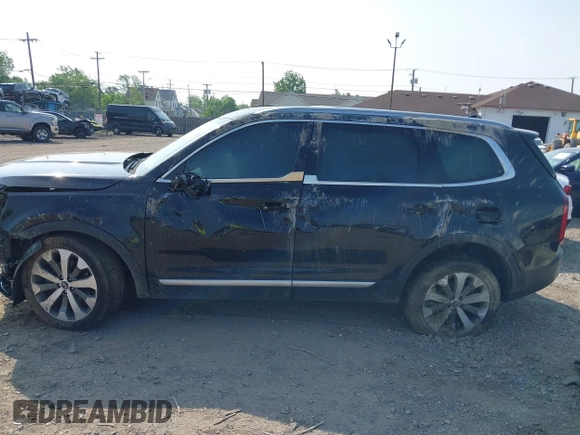 2021 Kia Telluride S with VIN 5XYP6DHC5MG173337, listed as a IAAI auction lot 42414885 with Not provided miles and . Bid and sale history available at DreamBid. Image 14.