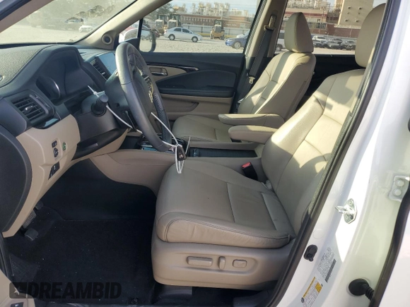 2022 Honda Pilot Touring 7-Passenger with VIN 5FNYF5H65NB011768, listed as a Copart auction lot 74134503 with 27,517 mi miles and Salvage title. Bid and sale history available at DreamBid. Image 7.