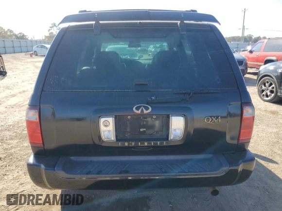 2002 Infiniti QX4 with VIN JNRDR09X92W210247, listed as a Copart auction lot 84913164 with 160,938 mi miles and Salvage Title. Bid and sale history available at DreamBid. Image 6.