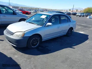 2002 Honda Civic EX with VIN 1HGES26842L006993, listed as a IAAI auction lot 41891213 with 219,196 mi miles. Bid and sale history available at carsss.com. Image 2.